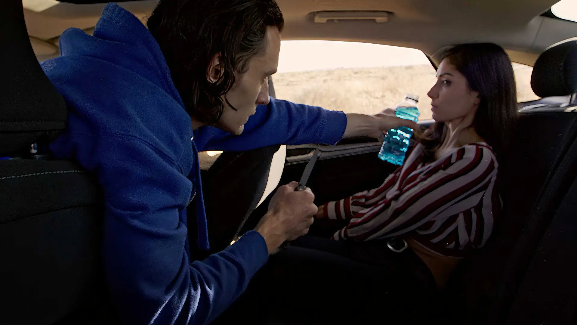 The Girl in the Backseat backdrop