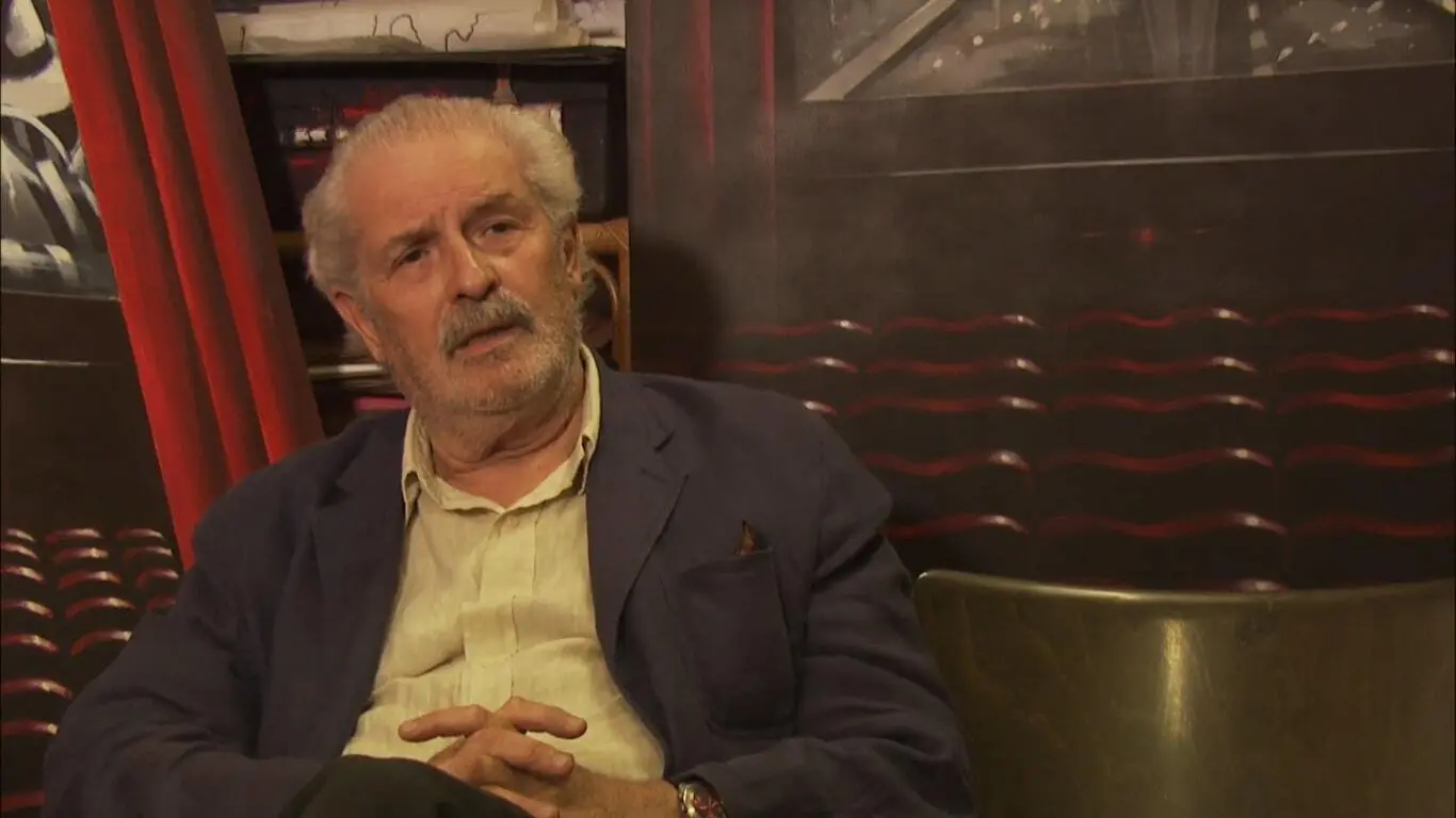 Red Chairs - Parma and the Cinema backdrop